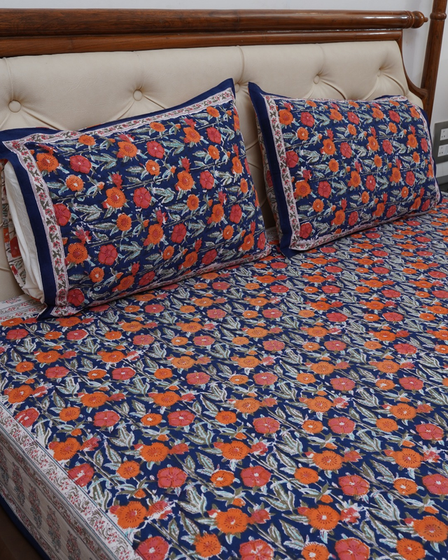 FESTIVE HANDBLOCK PRINTED BEDSHEET WITH 2 REVERSIBLE PILLOW COVERS